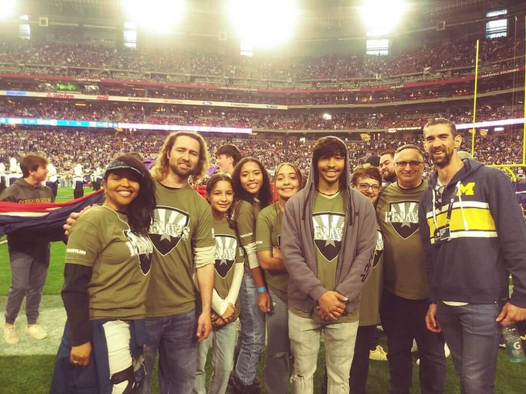 VVCAZ volunteers on the field at the stadium